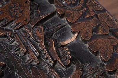 Lot 103 - A 20th Century Oriental carved camphor wood blanket box