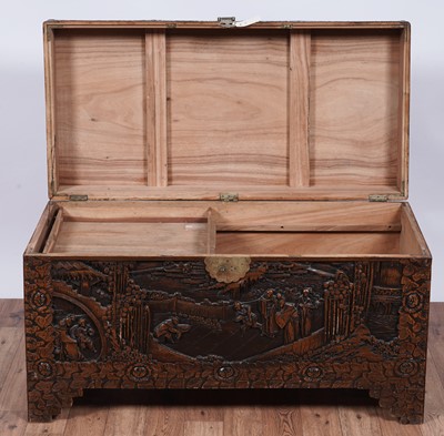 Lot 103 - A 20th Century Oriental carved camphor wood blanket box
