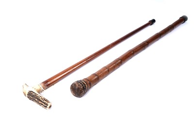 Lot 249 - Two walking sticks including one Chinese