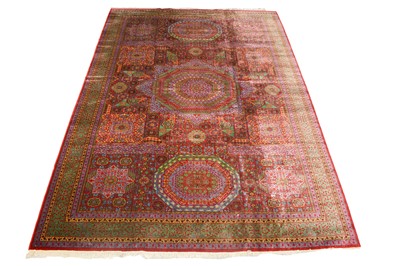 Lot 1227 - A Kirman carpet