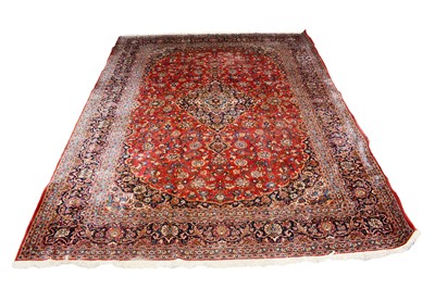 Lot 1228 - A Persian hand-made Kashan carpet