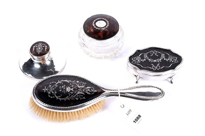 Lot 1088 - A collection of silver and tortoiseshell accessories