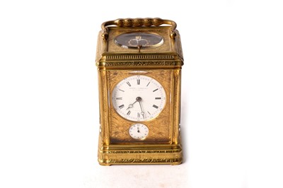 Lot 1372 - A 19th Century French repeating carriage alarm clock retailed by Howell, James & Co