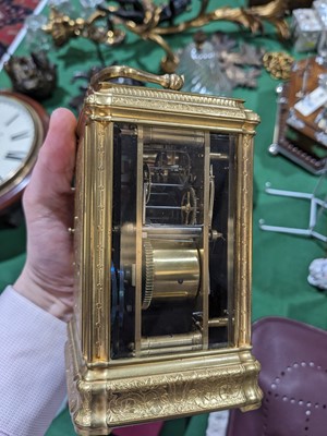 Lot 1372 - A 19th Century French repeating carriage alarm clock retailed by Howell, James & Co