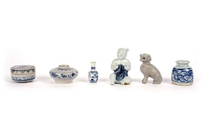 Lot 866 - Nanking Cargo figures of a boy and dog; and four small jars