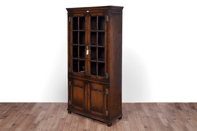 Lot 118 - Titchmarsh and Goodwin: a Georgian style oak bookcase