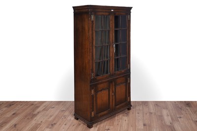 Lot 118 - Titchmarsh and Goodwin: a Georgian style oak bookcase