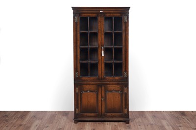 Lot 118 - Titchmarsh and Goodwin: a Georgian style oak bookcase