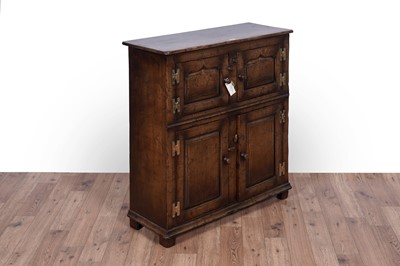 Lot 121 - Titchmarsh and Goodwin: a Georgian style oak cabinet