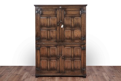 Lot 123 - Titchmarsh and Goodwin: a Georgian style oak press cupboard