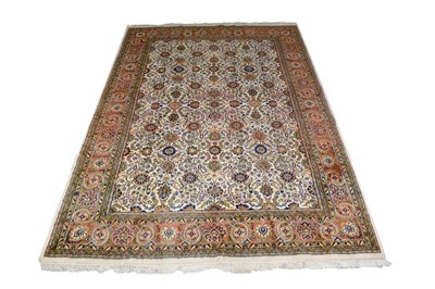 Lot 1229 - A hand-made Tabriz carpet