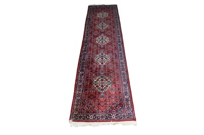 Lot 1233 - A hand-made Tabriz runner