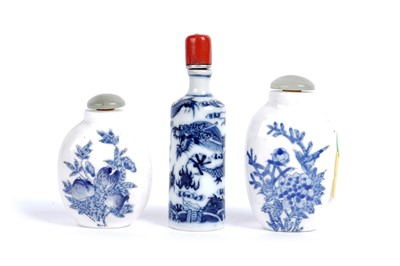 Lot 845 - A Chinese dragon snuff bottle; and two others