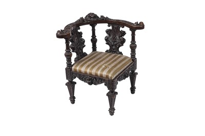 Lot 1467 - A Victorian carved oak corner chair