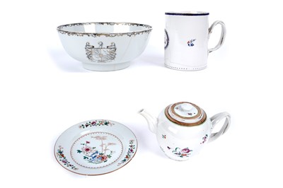 Lot 882 - A Chinese armorial bowl, mug, teapot and a plate