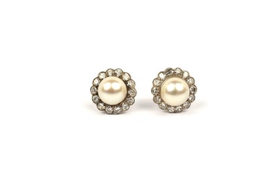 Lot 815 - A pair of cultured pearl and diamond cluster earrings