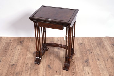 Lot 49 - Wylie & Lockhead Ltd, Glasgow: a walnut banded nest of three tables