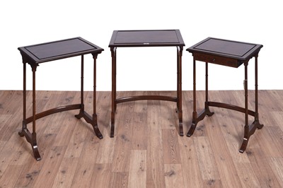 Lot 49 - Wylie & Lockhead Ltd, Glasgow: a walnut banded nest of three tables