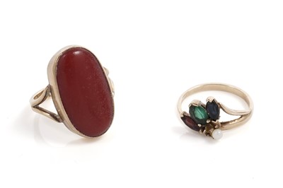 Lot 732 - A coral cocktail ring; and a dress ring