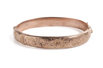 Lot 721 - A 9ct rose gold bangle