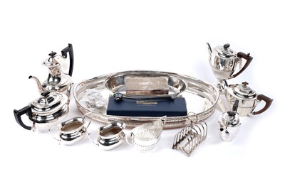 Lot 509 - An Edwardian silver teapot and a collection of silver-plated wares