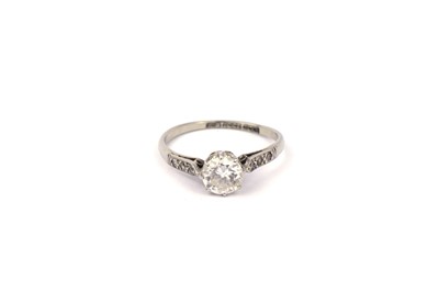 Lot 822 - An Art Deco solitaire diamond ring; and a platinum band