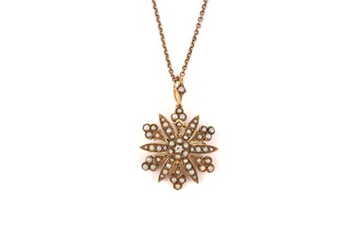 Lot 823 - An Edwardian seed pearl and diamond pendant necklace