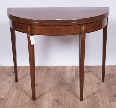 Lot 111 - An Edwardian inlaid mahogany card table