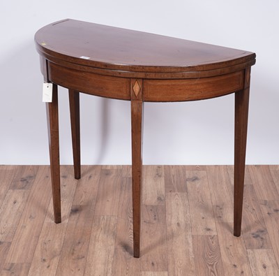 Lot 111 - An Edwardian inlaid mahogany card table