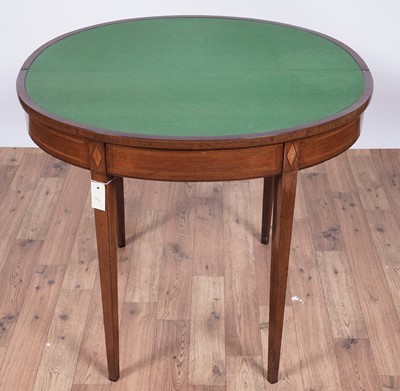 Lot 111 - An Edwardian inlaid mahogany card table