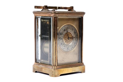 Lot 218 - A late 19th Century French brass carriage clock