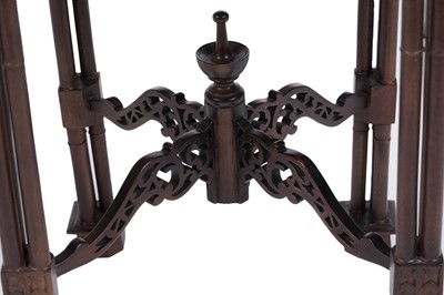 Lot 68 - A pair of modern mahogany Chippendale style urn stands