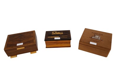 Lot 42 - A 20th Century walnut cigarette dispenser; and two cigar boxes