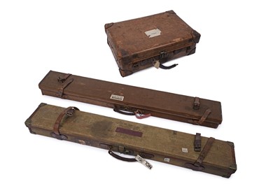 Lot 232 - Two 20th Century cloth bound gun cases and a leather suitcase