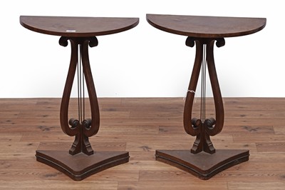 Lot 28 - A pair of small mahogany demilune side tables