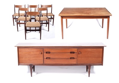 Lot 59 - A mid-20th Century teak and Afromosia matched dining room suite