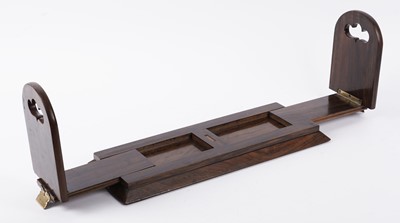 Lot 248 - A walnut Betjemann’s Patent ‘Self Closing’ book slide