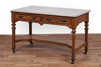 Lot 20 - An early 20th Century walnut marble top washstand