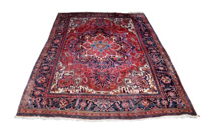 Lot 1236 - A Persian hand-made Heriz carpet