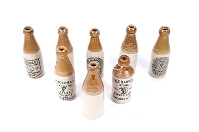 Lot 413 - A selection of local interest stoneware bottles