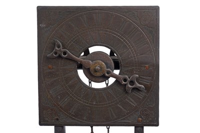 Lot 209 - A 20th Century oak and brass wall hanging water clock