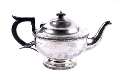 Lot 1012 - A George V silver teapot