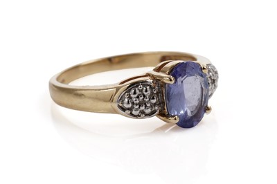 Lot 618 - A tanzanite and diamond dress ring