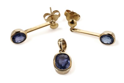 Lot 624 - A pair of sapphire drop earrings and a sapphire pendant