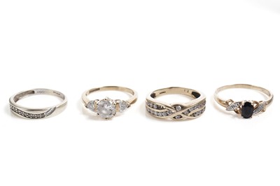 Lot 656 - A selection of four gold rings