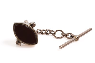 Lot 667 - A banded onyx and carnelian swivel fob pendant