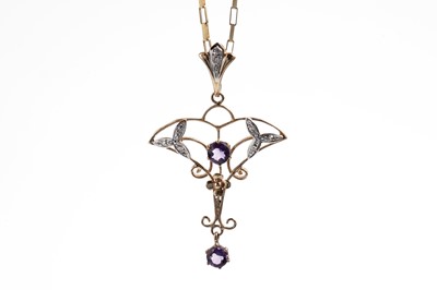 Lot 674 - An Edwardian style amethyst and diamond drop pendant necklace