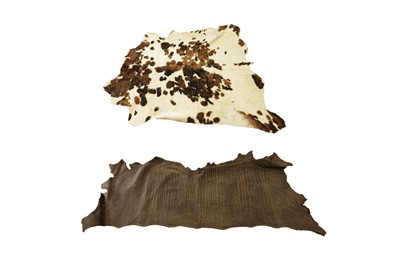 Lot 1950 - A cowhide rug; and one other