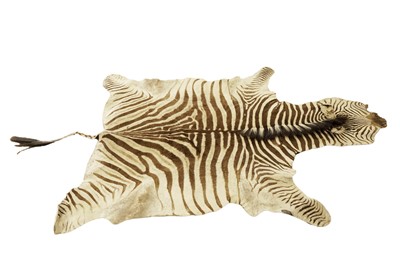 Lot 1951 - A zebra hide rug