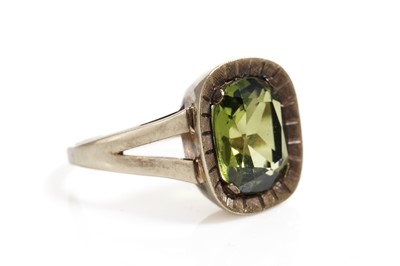 Lot 835 - A grossular garnet single stone dress ring